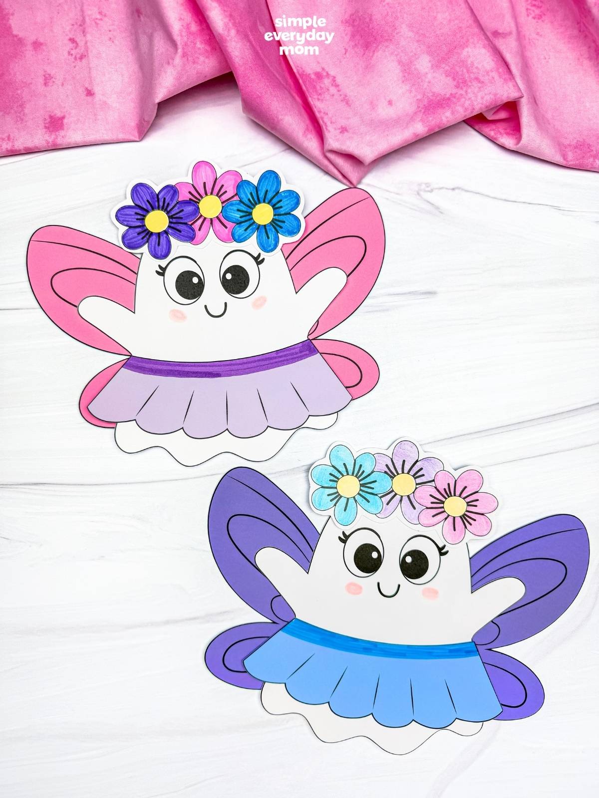 A completed craft of two Fairy Ghost Disguise Craft designs with different colored fairy wings, flower crowns, and skirts displayed side by side.