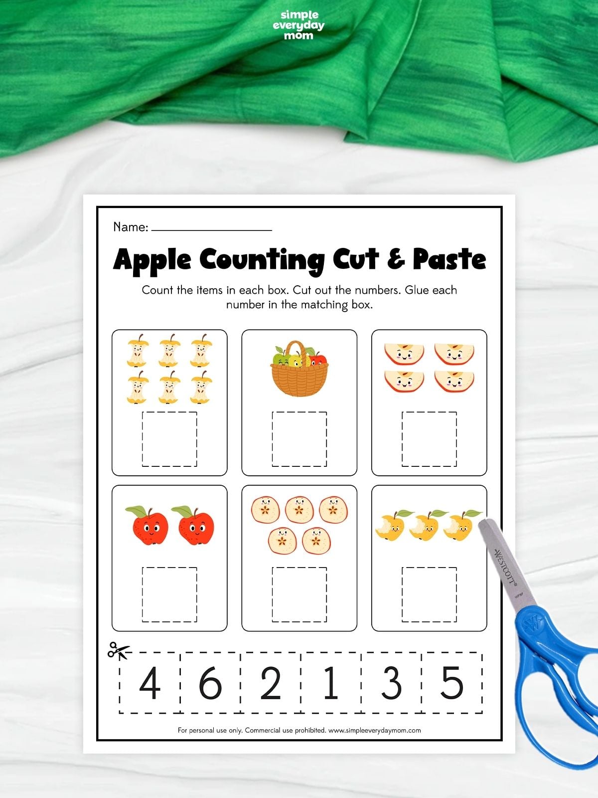 Apple counting cut-and-paste worksheet with six picture groups and number choices from 1 to 6.