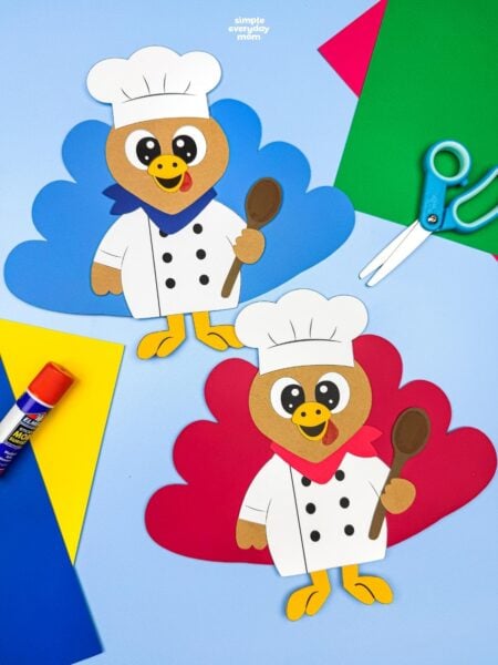 A completed Craft featuring two chef turkey disguises with colorful tail feathers, chef hats, and spoons.