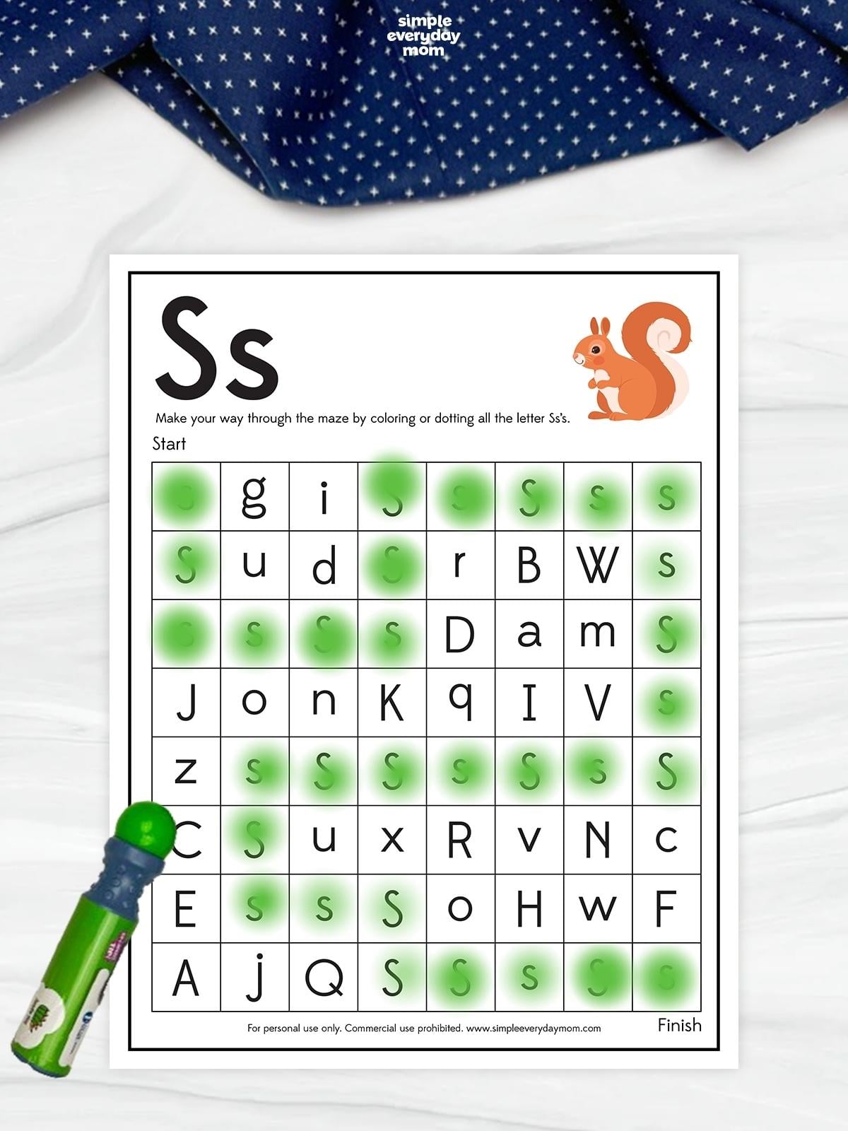 Letter S maze worksheet with a squirrel illustration and a grid of mixed letters, featuring a green dotted path connecting uppercase and lowercase S letters from start to finish.