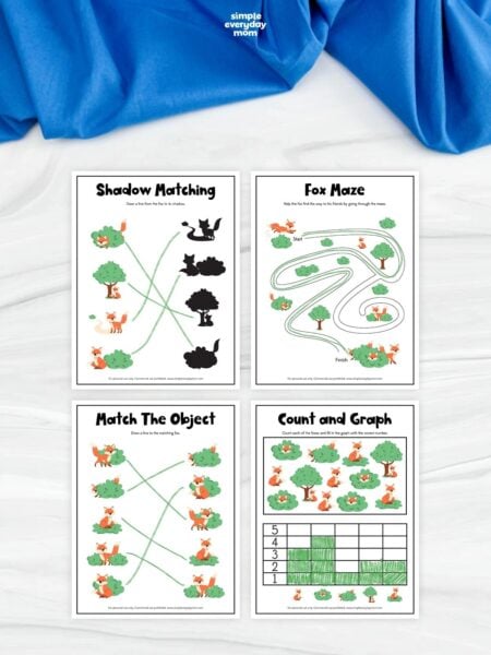 Collage of four fox activity worksheets featuring shadow matching, a maze, object matching, and counting with a graph. Children practice matching foxes and shadows, navigating a maze, pairing identical pictures, and counting fox-themed objects. The printable worksheets are arranged in a grid on a white surface with blue fabric above.