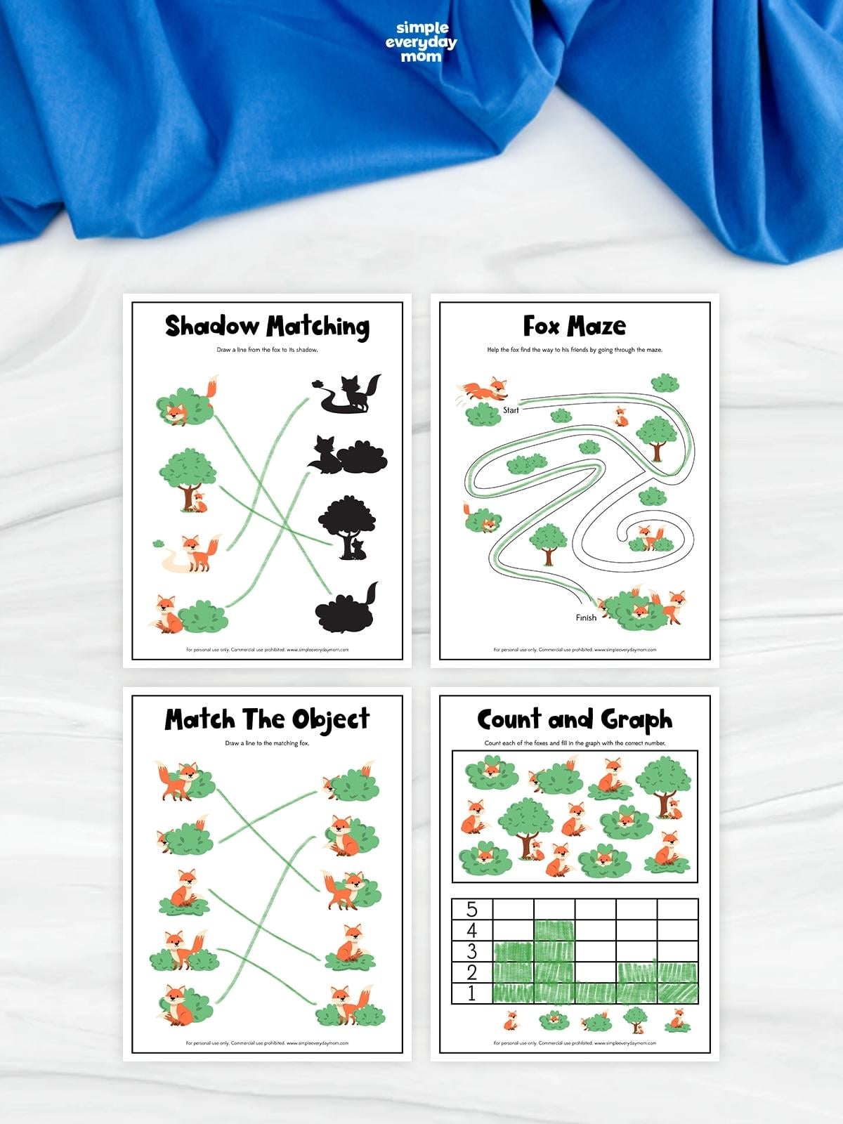 Collage of four fox activity worksheets featuring shadow matching, a maze, object matching, and counting with a graph. Children practice matching foxes and shadows, navigating a maze, pairing identical pictures, and counting fox-themed objects. The printable worksheets are arranged in a grid on a white surface with blue fabric above.