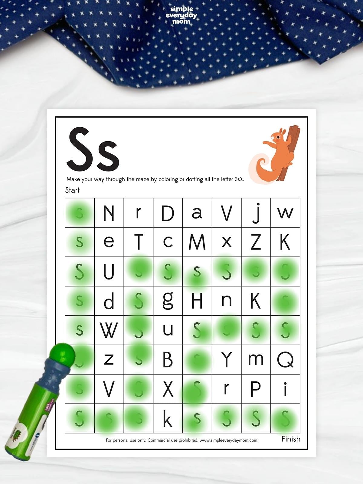 Letter S maze worksheet with a squirrel illustration and a grid of mixed letters, featuring a green dotted path connecting uppercase and lowercase S letters from start to finish.