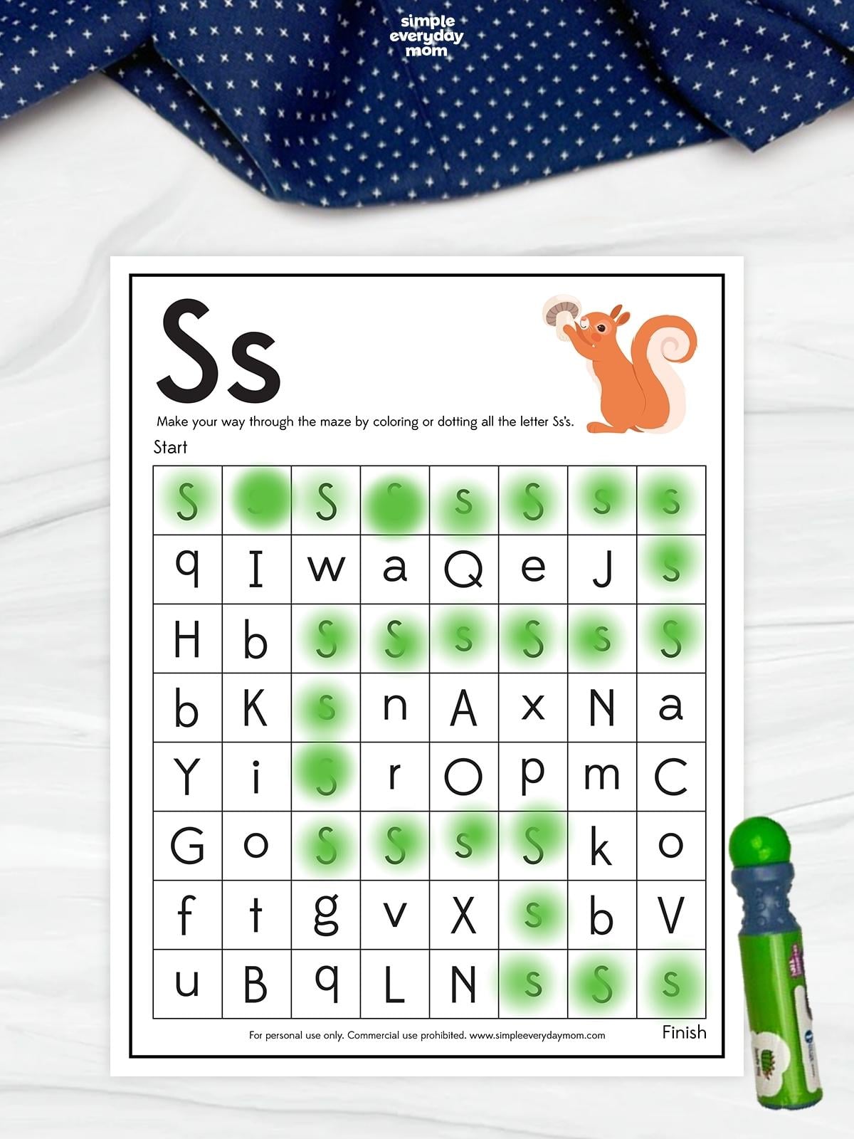 Letter S maze worksheet with a squirrel illustration and a grid of mixed letters, featuring a green dotted path connecting uppercase and lowercase S letters from start to finish.