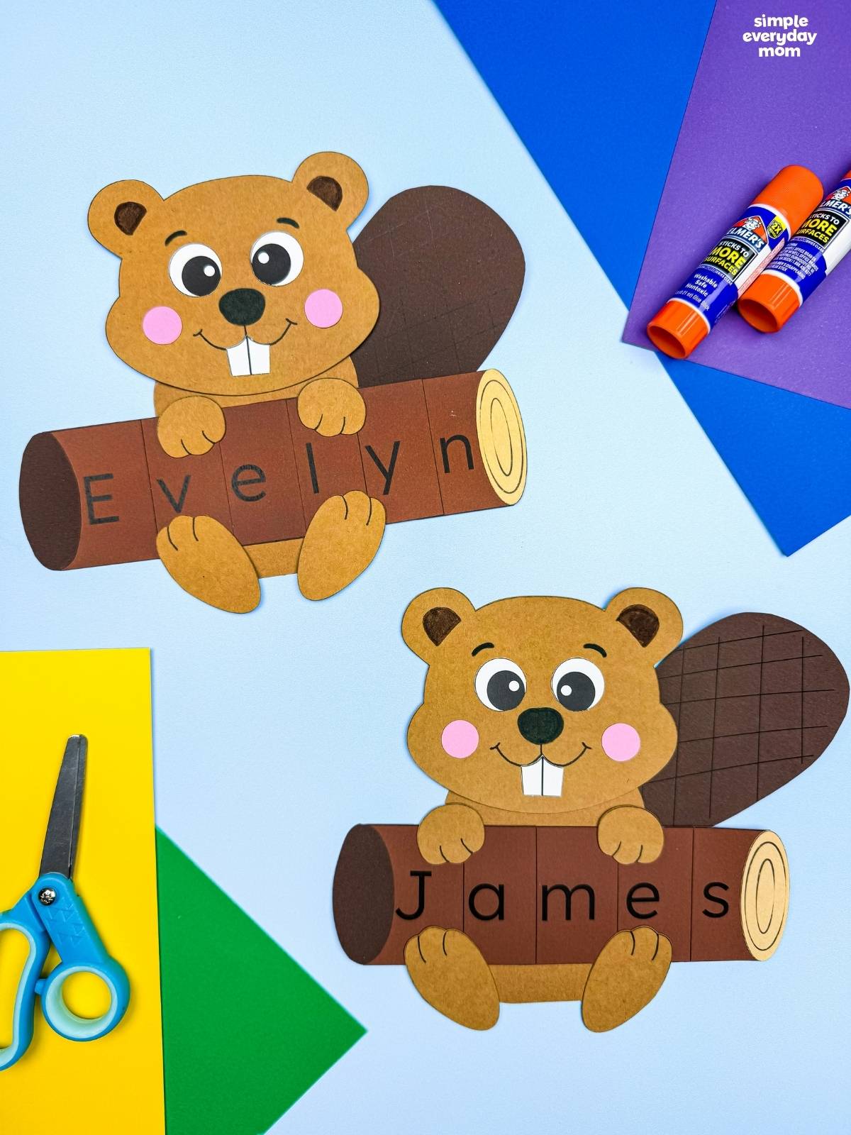 Side by side completed Beaver Name Crafts showing beavers holding logs that spell Evelyn and James.