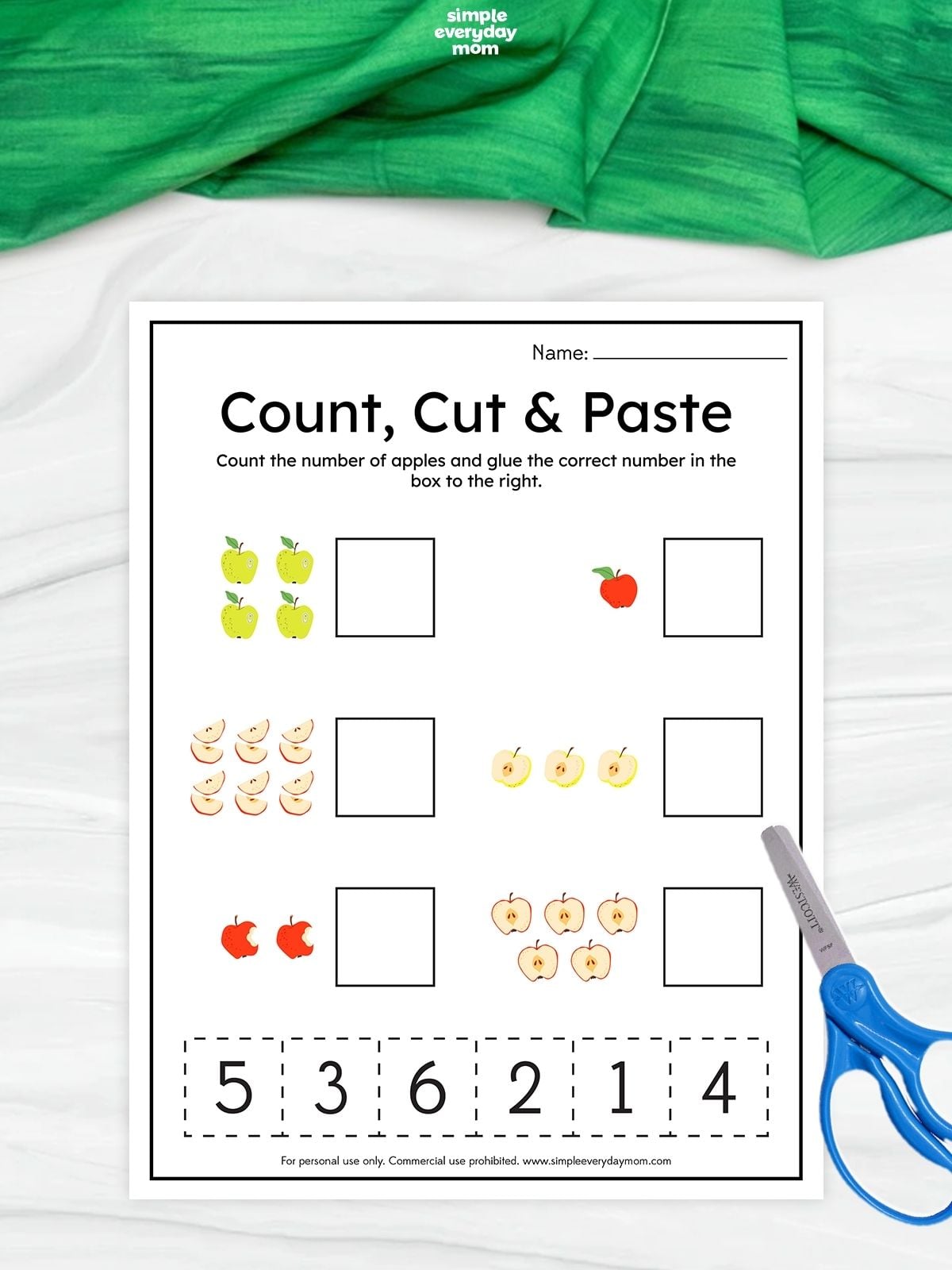Count, cut and paste apple worksheet with groups of apples and number pieces for preschoolers to practice counting and fine motor skills.