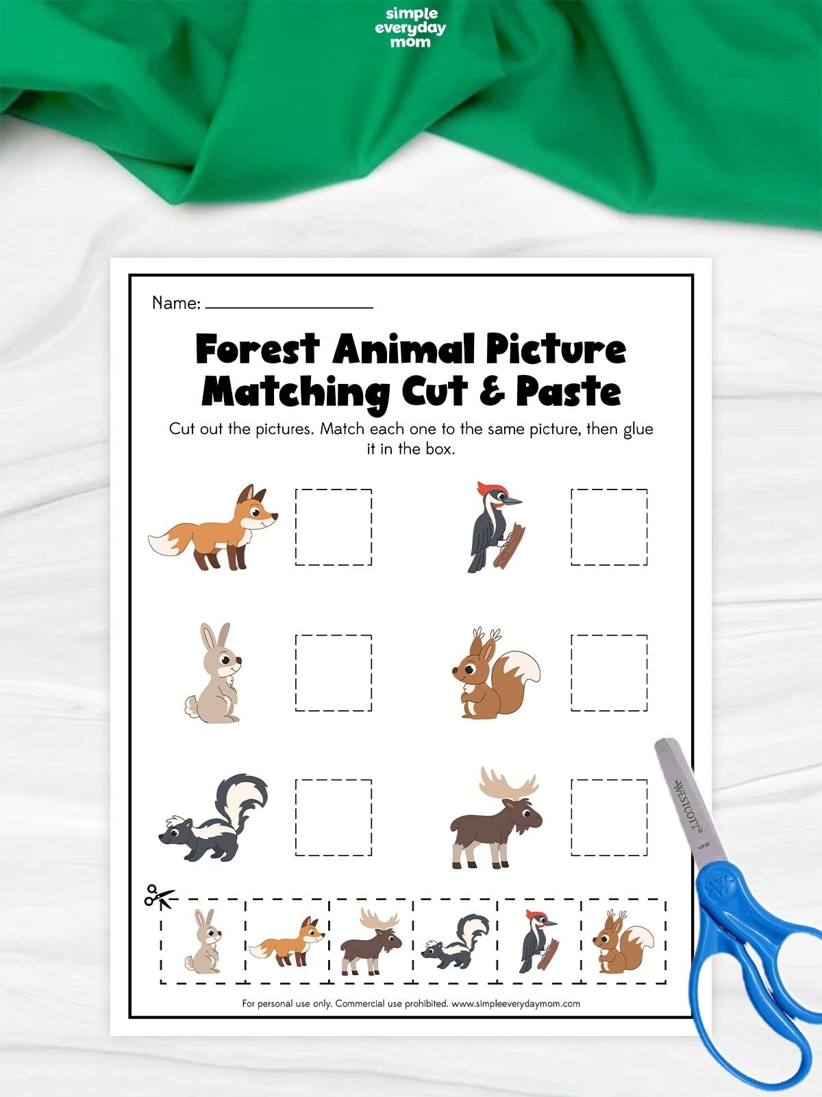 Forest animal picture-matching cut-and-paste worksheet featuring a fox, woodpecker, rabbit, squirrel, skunk, and moose, with matching animal pictures to cut out and glue into boxes.