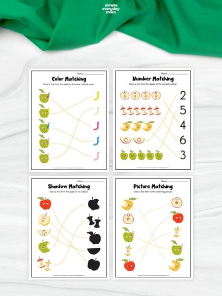 Four apple-themed preschool worksheets featuring color, number, shadow, and picture matching activities with completed matching lines.
