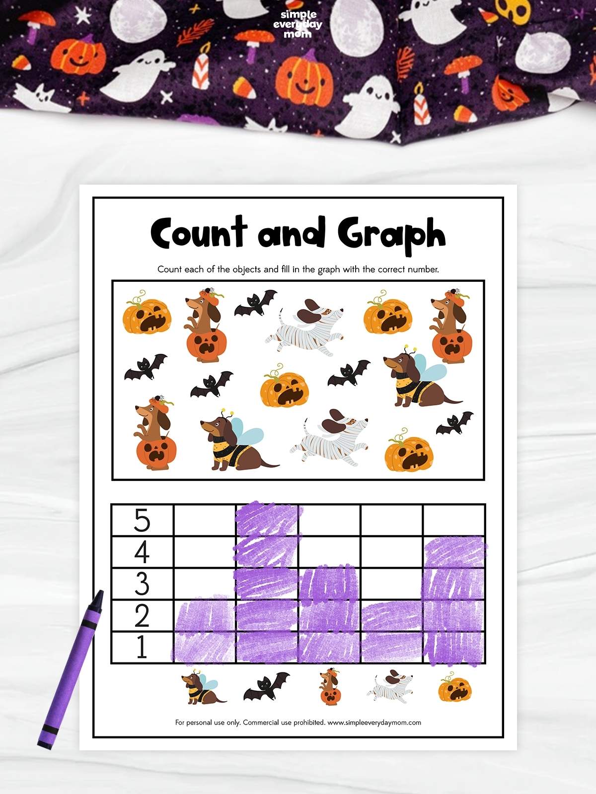 Halloween-themed counting and graphing worksheet featuring cartoon bats, pumpkins, and dogs dressed in costumes. A purple crayon graph records the number of each pictured object, with counts ranging from two to five.