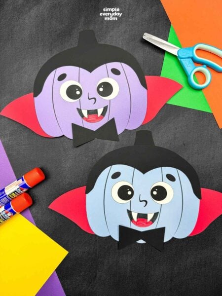 A completed craft showing two vampire pumpkin disguises with capes, fangs, and bow ties alongside craft supplies.