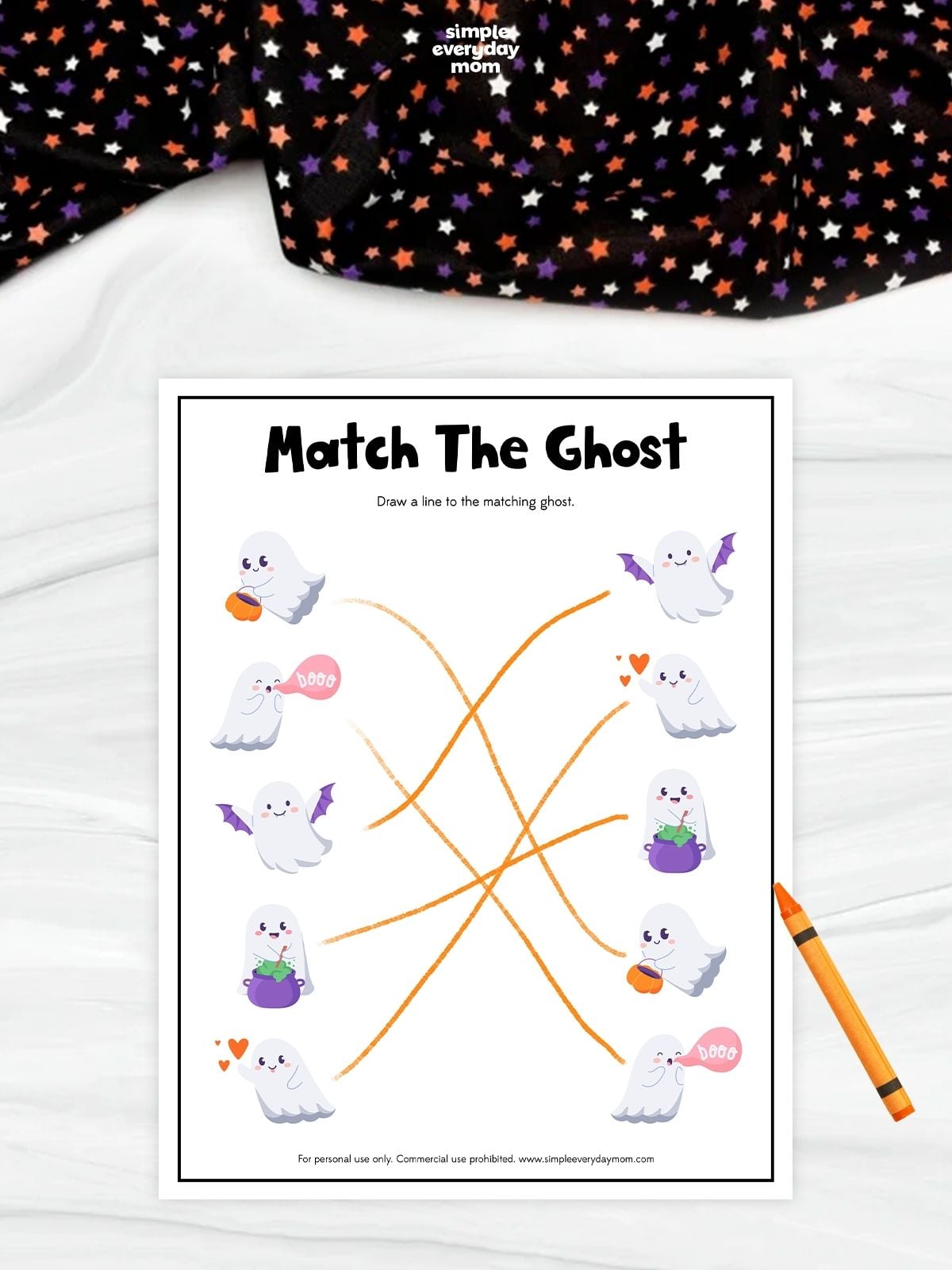 Printable ghost matching worksheet for kindergarten featuring cute Halloween ghosts connected with lines to build visual discrimination and fine motor skills.