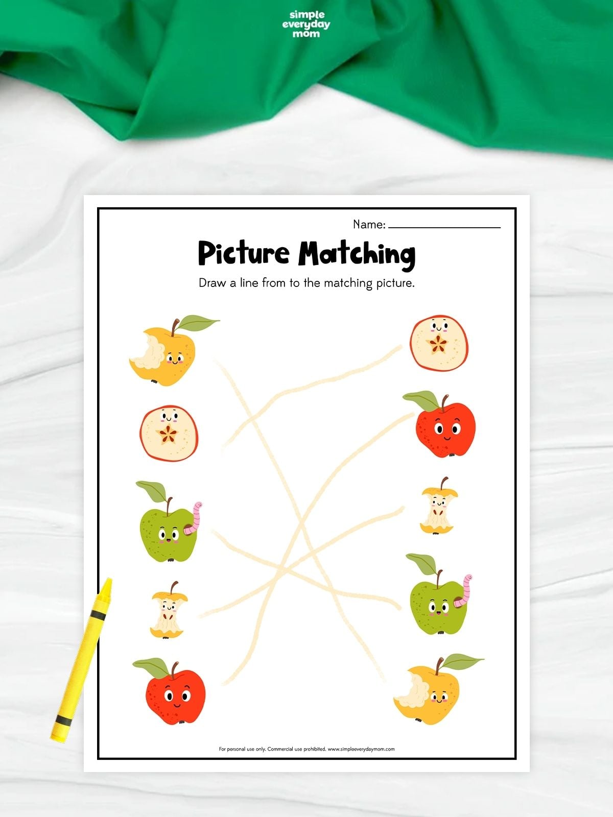 Apple picture matching worksheet with five apple illustrations connected by lines to their identical matching pictures.