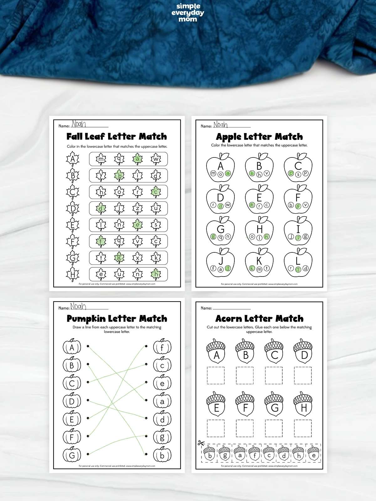 Four fall-themed alphabet worksheets featuring leaf, apple, pumpkin, and acorn activities for matching uppercase letters A–L with their lowercase counterparts.