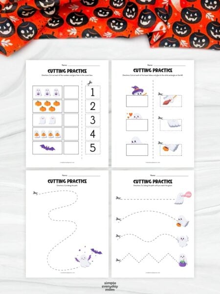 A completed ghost counting worksheet featuring Halloween pictures and cut out numbers 1 to 5 for kindergarten math and scissor practice.