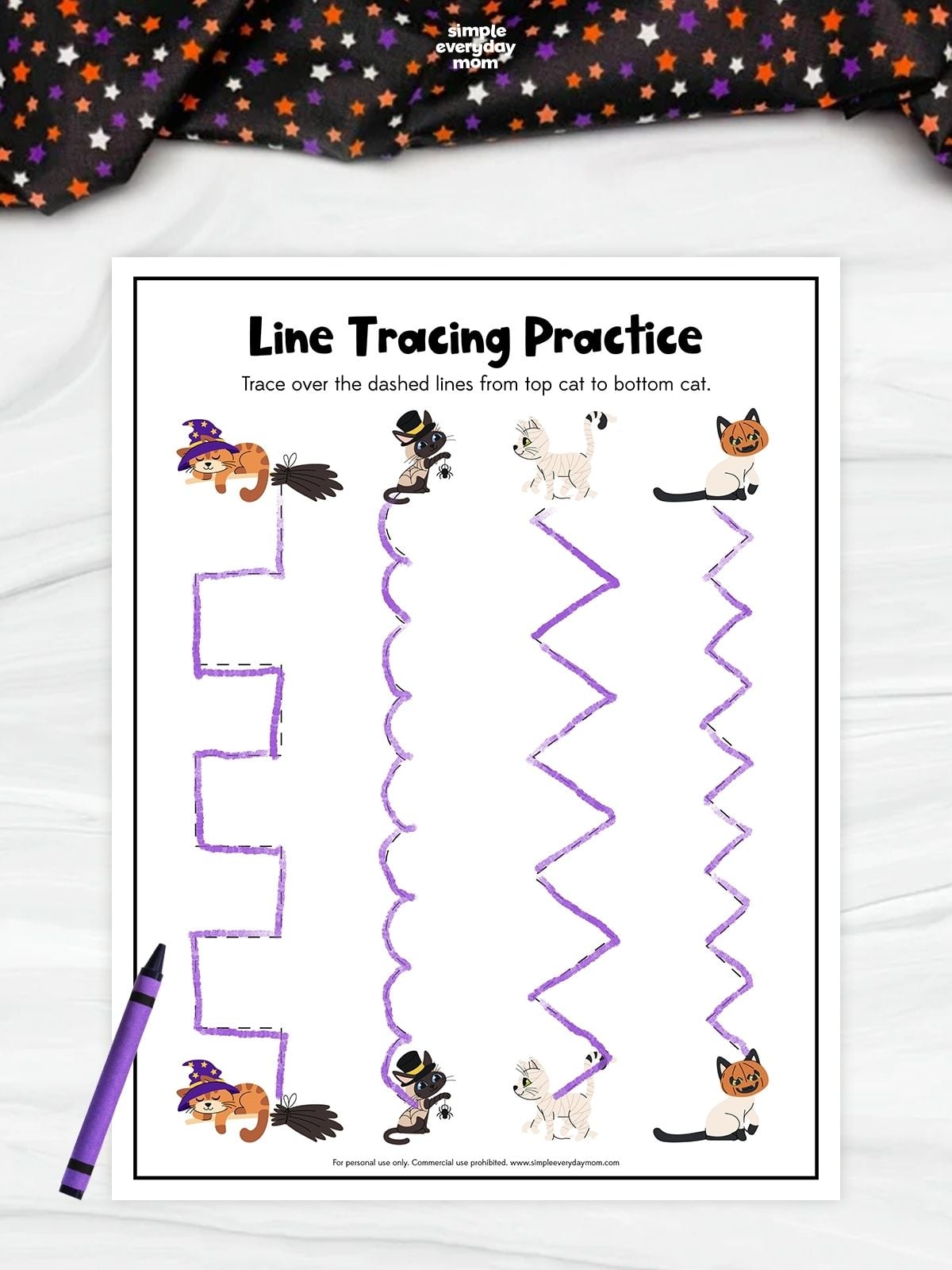Line tracing practice worksheet featuring four pairs of Halloween-themed cats connected by stepped, curved, and zigzag paths. The dashed paths have been traced in purple from each top cat to its matching cat below.