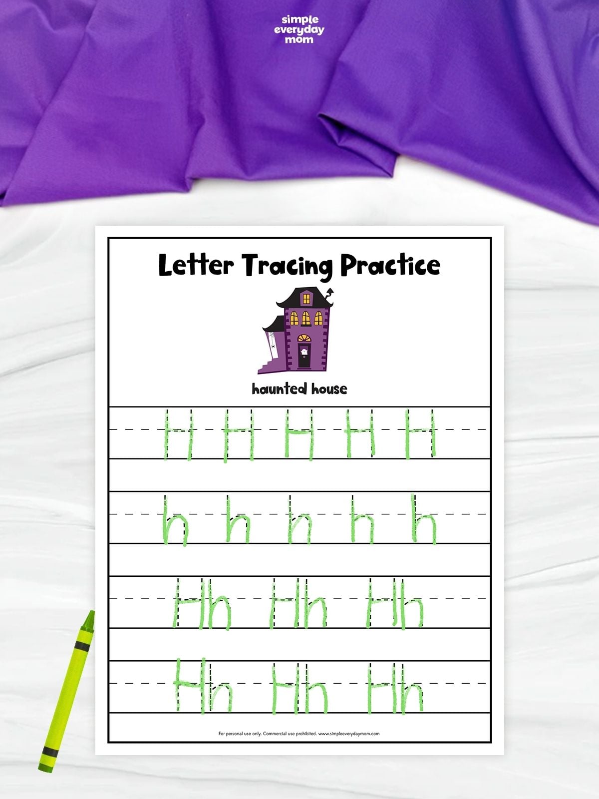 Letter tracing practice worksheet featuring a purple haunted house and rows for tracing uppercase H, lowercase h, and “Hh.” The letters have been traced in green.